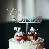 The Den: Cake Topper: A